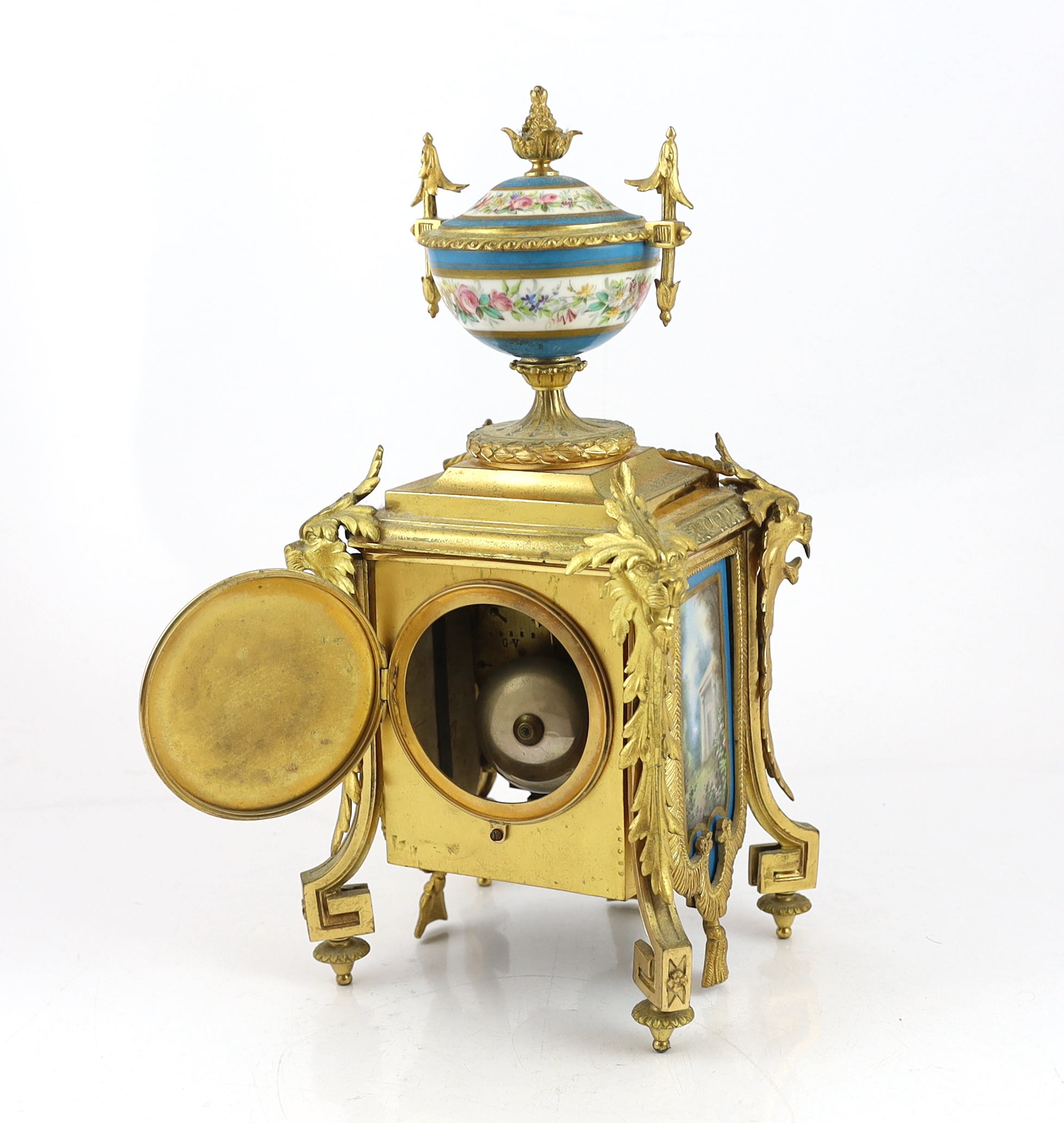 A 19th century French ormolu and Sevres style porcelain clock garniture, clock 19cm wide, 15cm deep, 37cm high candelabra 19cm wide, 30.5cm high